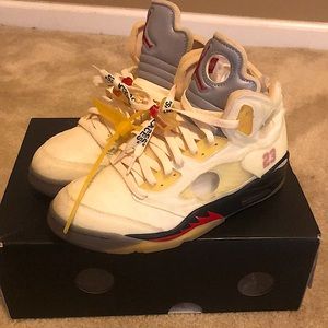 A pair of Jordan off white sail 5’s Bailey worn